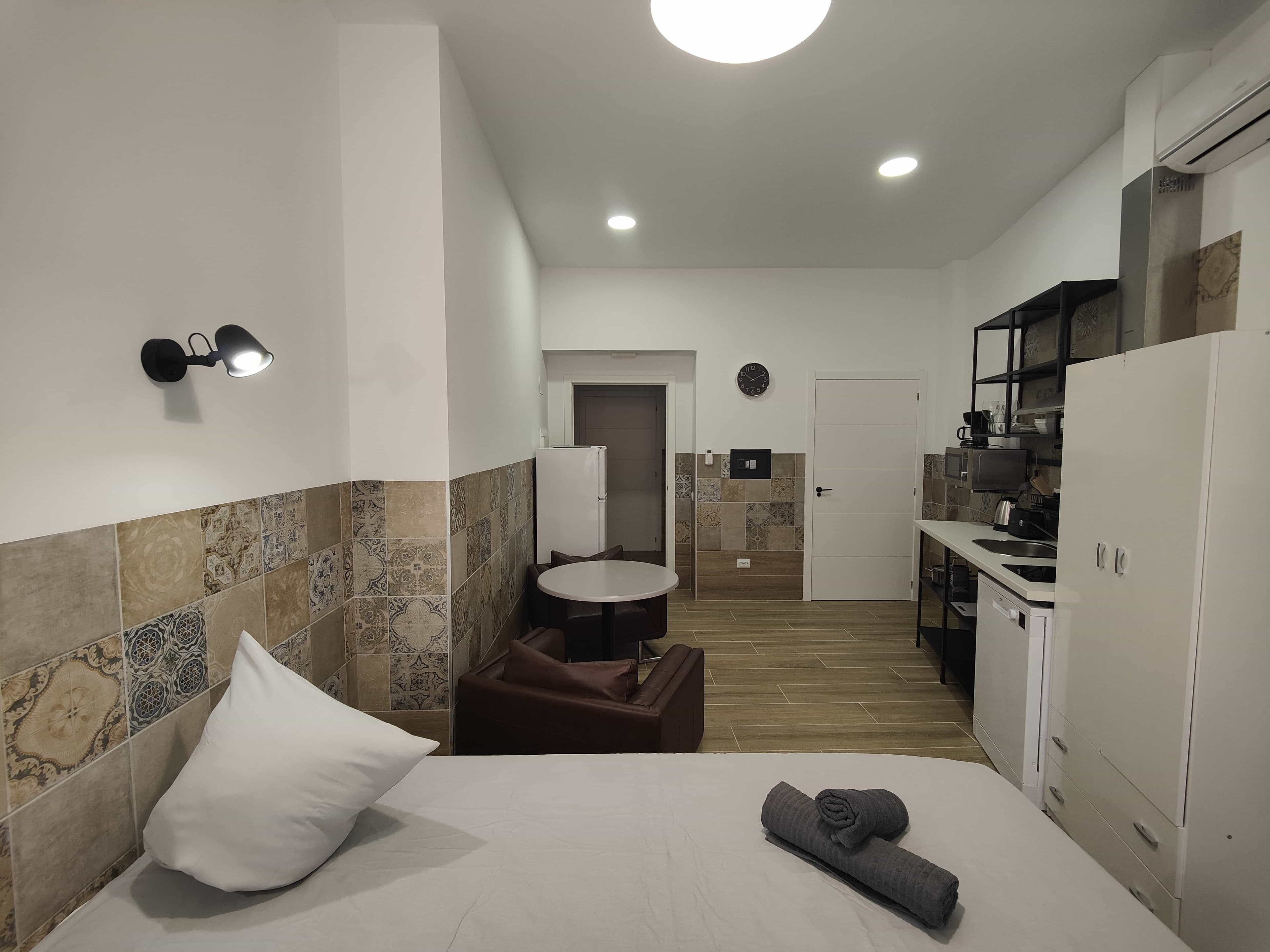 The same studio at Pueblo Mar, looking down its full length toward the kitchenette and entrance